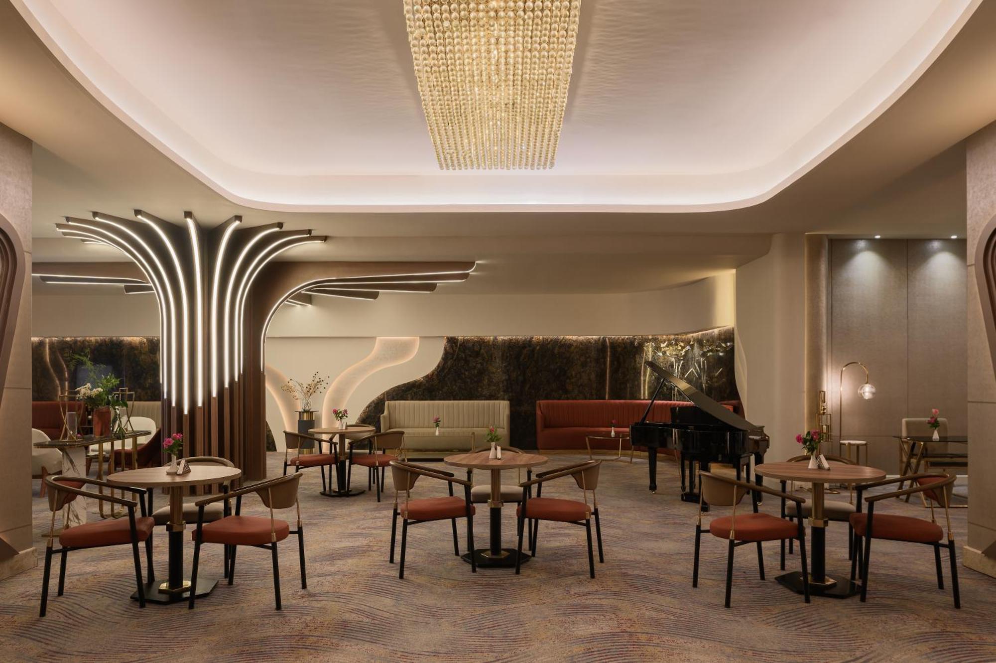Mirage Hotel & Conference Center Alexandrie Extérieur photo The interior of the restaurant